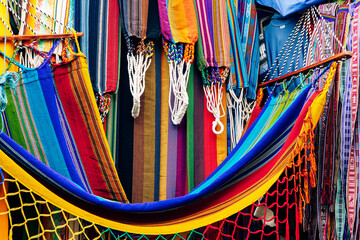 Colorful Andean fabric textiles on the local souvenir market in Otavalo, Ecuador. South America.