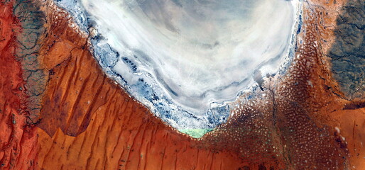 abstract landscape photo of the deserts of Africa from the air emulating the shapes and colors of...