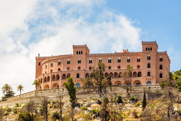 View of the Castello Utveggio on the hill of Pellegrino, mount on a clear sunny day. Palermo, Sicily.