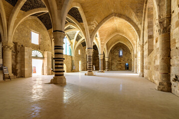 Fototapeta premium View of the interior of The vaulted banquet room in the Maniace Castle in the island of Ortigia. It was built during the Swabian period by Emperor Frederick II of Swabia.