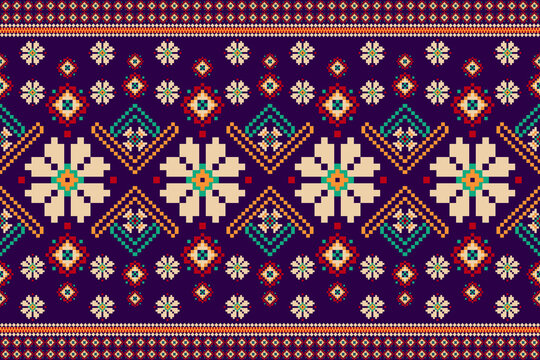 Beautiful knitted embroidery .geometric ethnic oriental seamless pattern on purple background.Aztec style,embroidery,abstract,vector,illustration.design for texture,fabric,clothing,wrapping,carpet.