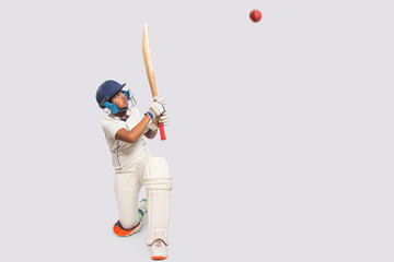 Portrait of boy hitting a shot  During a Cricket Game