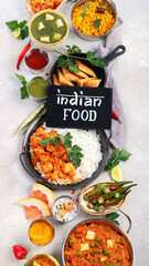 Indian food assortment on light background.