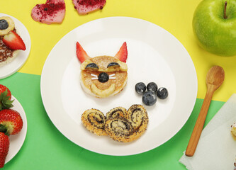 Healthy toasts for kids on colourfull background.