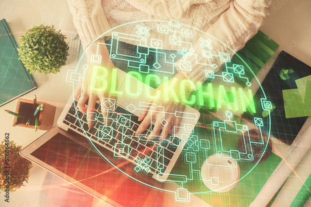 Poster double exposure of woman hands working on computer and blockchain theme hologram drawing. top view. 