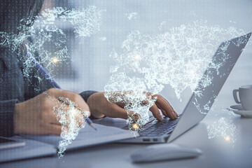 Double exposure of woman hands typing on computer and social network theme hologram drawing. People media concept.