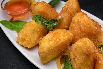 Nuggets with cheese. mint and jam