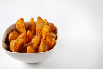 French fries are in the plate. On a white background. Copy space.