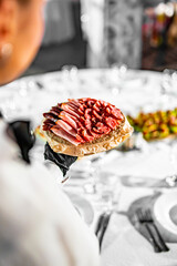waiter holds tray with food. Restaurant service. buffet or catering.