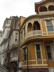 Naklejka premium Beautiful wooden houses in Arnavutkoy, Istanbul. Beyazgul street view. Street view of Arnavutkoy area, Istanbul. Historical neighbourhood famous for ottoman wooden houses