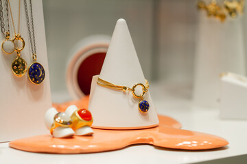 Showcase in jewellery store. jewelry diamond gold shop with rings and necklaces luxury retail store...