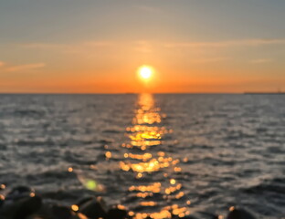 sunset at  sea sun beam and light reflection on water natire summer defocus   background 