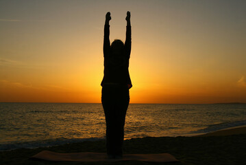 Fototapeta premium A yoga posture on the beach