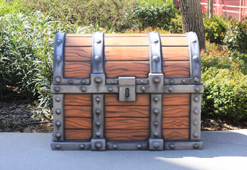 wooden pirate chest outdoors closeup