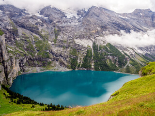 Oeschinen Lake aka Oeschinensee in the Bernese Oberland region of Switzerland east of Kandersteg - 501880479