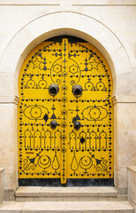 Typical yellow gate in Tunisia
