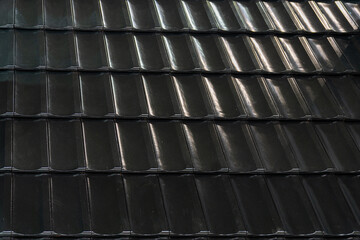 Black ceramic tiles on the roof