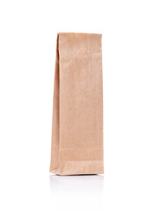 Recycled brown craft paper package for tea or coffee isolated on white background