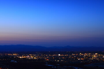 Obraz premium 岩手県北上市 夕焼けの北上市街地