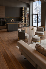 chic modern design of a dark expensive interior of a luxurious country house with huge panoramic windows and a magnificent view of the divine forest