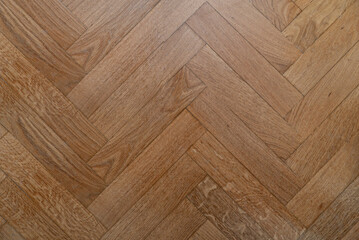 herringbone-laid oak parquet boards. vector wood texture background