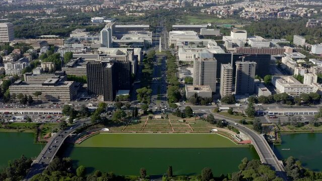 Aerial view of the modern EUR district in Rome, Italy,  built for the Universal Exposition that should have been held in the Capital in 1942. There is a small artificial lake and the neighborhood park