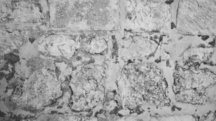 Damaged Brick Wall. Black and White Photo