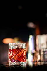Cocktail Negroni with gin, campari martini rosso and orange. negroni cocktail at the bar