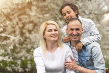 Happy family having picnic in nature. Smiling family picnicking in the park. spring nature