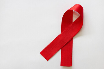 Red ribbon, red May. Awareness campaign on the prevention of oral cancer.