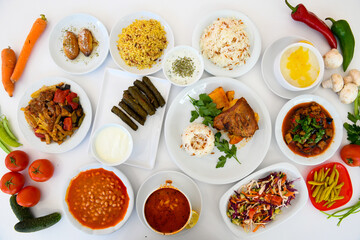 Table scene of assorted take out or delivery foods. Traditional Turkish cuisine. Various Turkish desert and cake. Top down view on a table.