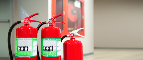 Fire extinguisher, Close-up red fire extinguishers tank in the building concepts of fire equipment...