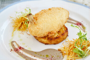 Chicken Kiev, meat cutlet with mashed potatoes and herbs. Shallow depth of field