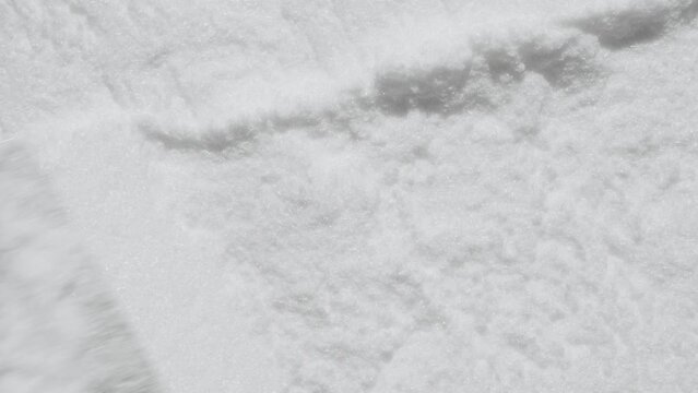 Maltodextrin, dextrose background footage. White powder texture video. Diet supplement, glucosamine, fructose. Collagen or protein, sport bioadditive like lysine, guarana, valine spreading by spatula