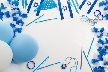 Items with the image of the Israeli flag. Patriotic holiday Independence day Israel - Yom Haatzmaut concept.