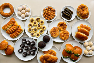 Table scene of assorted take out or delivery foods. Traditional Turkish cuisine. Various Turkish desert and cake. Top down view on a table.