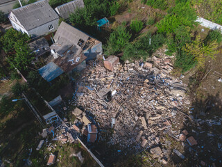 Destroyed residential private house due to explosion. The collapse of a brick house, the collapse of the walls