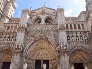 Fototapeta na wymiar Facade of Primada Santa Maria de Toledo Cathedral. Toledo, Castile La Mancha, Spain.