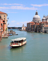 View of Canal Grande in the Island of Venice and only ferry boat during lockdown - obrazy, fototapety, plakaty