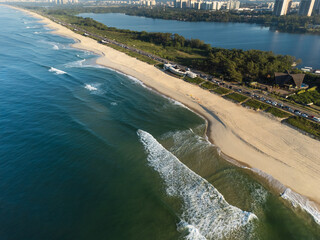Aerial view of Reserva beach, Marapendi lagoon and car traffic on Lucio Costa avenue. Barra da...