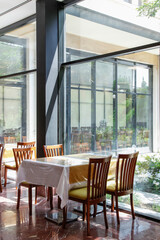 Restaurant in modern interior and tables and chair