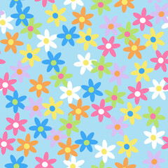 Bright colorful seamless pattern depicting a scattering of wildflowers of different colors. Textile and wallpaper design.