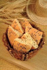 Traditional wheat bread in a straw basket
