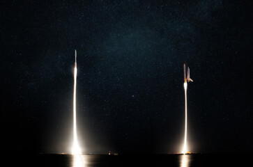Two blast-off space rockets take off into the starry sky. Space shuttles and spaceship successful...