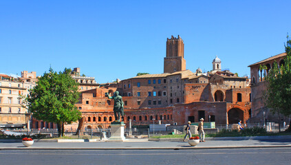 Rome street with a view of the ancient ruins