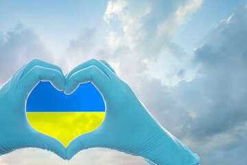 Heart against sky clouds. Save life concept