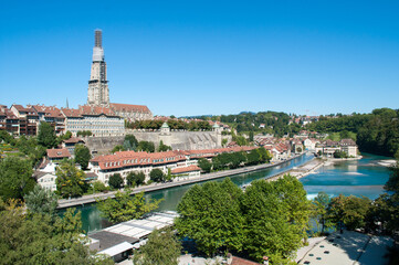Bern city in the Switzerland - view of the city, a tall tower, old houses and the river