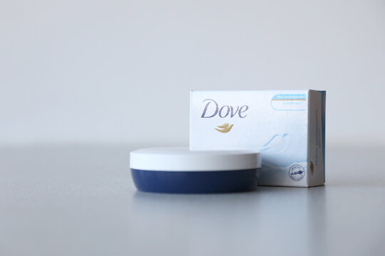 TERNOPIL, UKRAINE - APRIL 29, 2022: Production with Dove Logo on textured surface