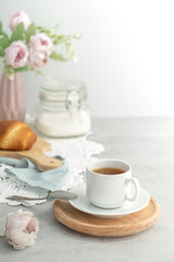 Obraz na płótnie Canvas Creative composition witn variety of tea, sugar, accessories for making tea