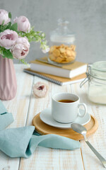Fototapeta na wymiar Tea on the table with cutlery, tea drinking. Selective focus